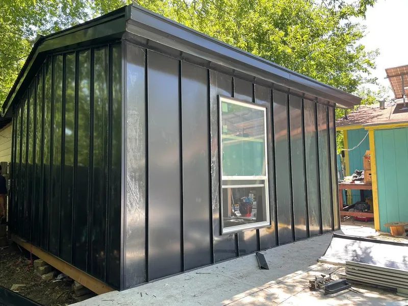 Black standing seam metal wall panels for Roof Inspection in Greeley